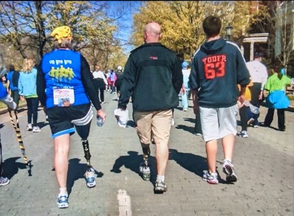 Robin, Joe, and Isaac at her first 10K in 2011