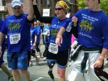 Robin racing alongside fellow runners